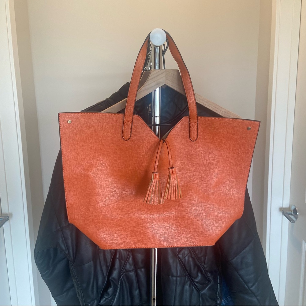 Neiman Marcus Orange Tote Bag with Double Handles and Tassel Details (see mark)